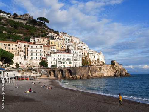 People enjoying a beach in a small Italian town along the the Amalfi Coast