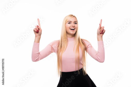 Woman pointing up with forefinger isolated on white background