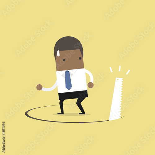 African businessman has ground cut beneath him.