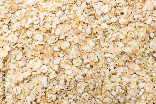Oat cereal flake. Closeup of grains, background use.