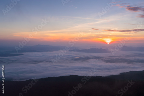 Sunrise and sea of mist around mountain in Thailand.