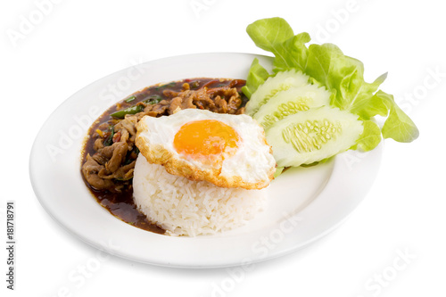 Holy Basil Fried Rice with pork and Fried Egg Sunny side Up isolated on white background