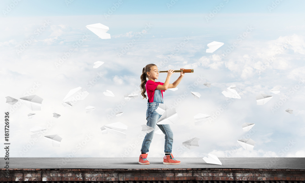 Concept of careless happy childhood with girl exploring this world Concept of careless happy childhood with girl exploring this world