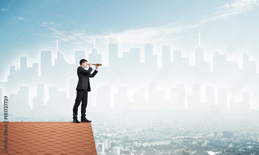 Engineer man standing on roof and looking in spyglass. Mixed media Engineer man standing on roof and looking in spyglass. Mixed media