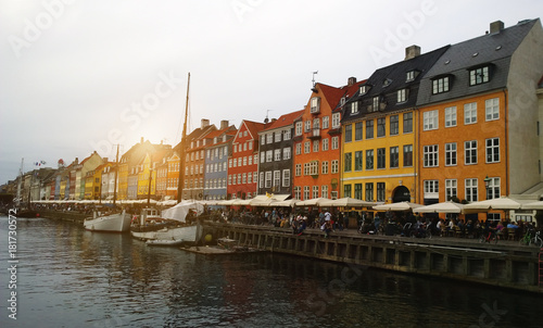 Nyhavn in Copenhagen - boats and colorful facades of the houses