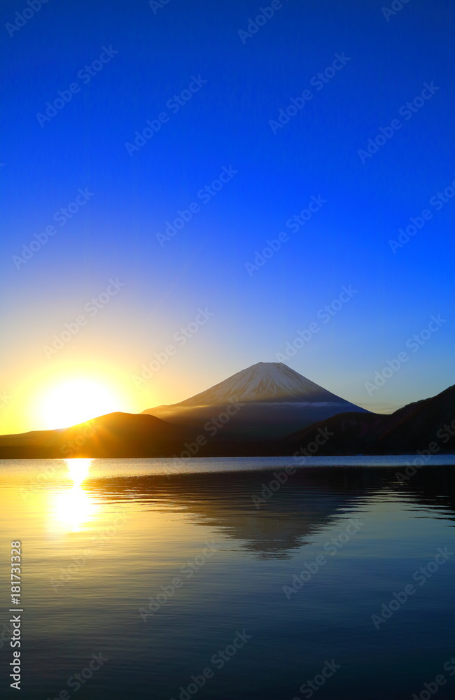 Mount Fuji of sunrise and blue sky from lake Motosu