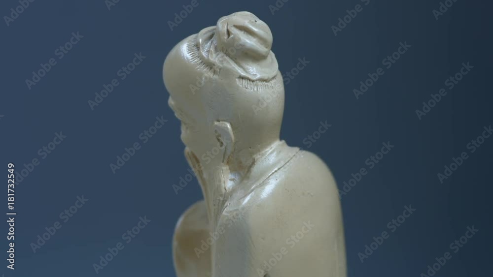 Carvings /Figure of a Chinese elder carved from a bone, in traditional clothes. Carvings /Figure of a Chinese elder carved from a bone, in traditional clothes.