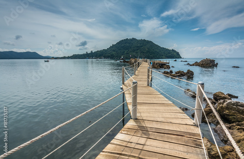  Beautiful long wooden bridge leading to the sea, Chanthaburi, Thailand.