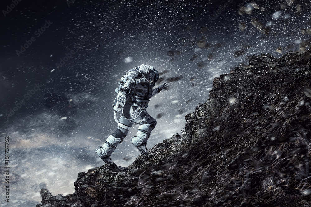 Fototapeta premium Spaceman running fast. Mixed media