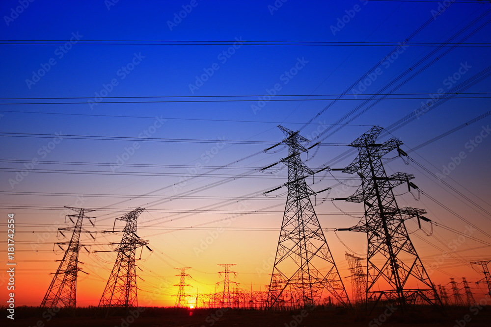 Sunset silhouette of pylon