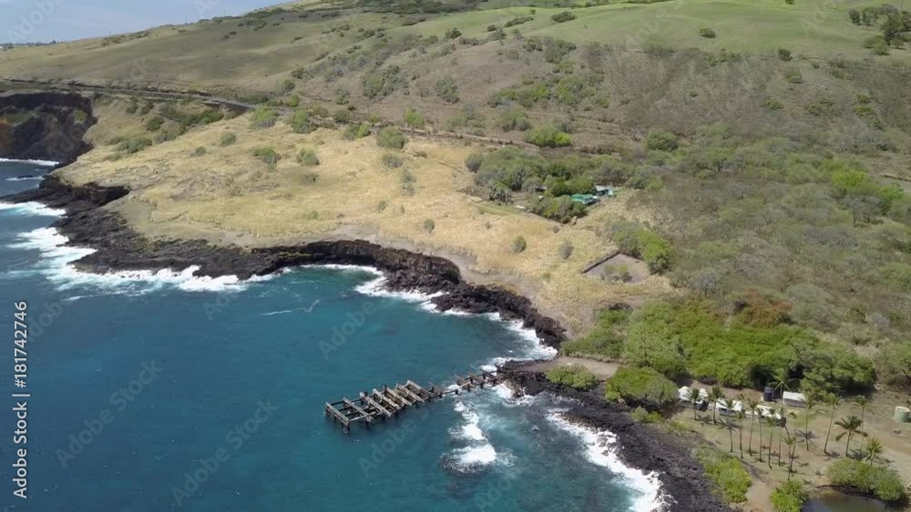 panning landscape shot of coastline and beautiful blue ocean on a sunny day on the Big Island in Hawaii panning landscape shot of coastline and beautiful blue ocean on a sunny day on the Big Island in Hawaii