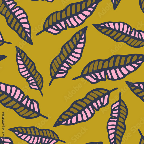 Tropical background with hand drawn palm leaves on yellow. Tropic seamless pattern. Vector illustration.