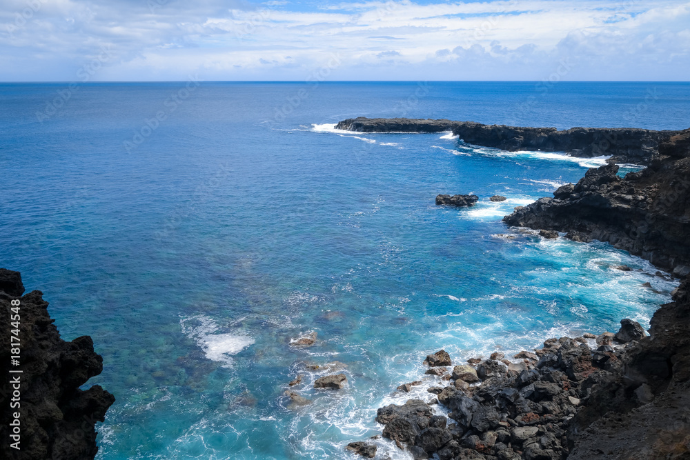 Cliffs and pacific ocean landscape vue from Ana Kakenga cave in Easter island