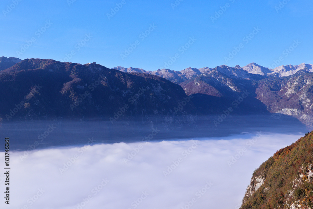 bohinj valley covered with morning clouds