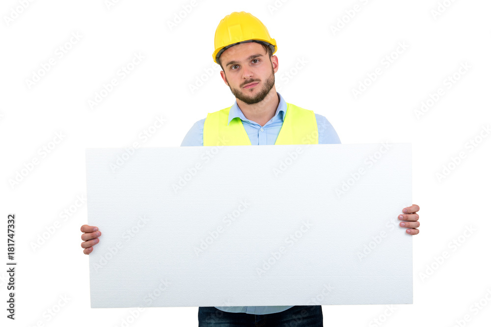 Happy male engineer holding an advertisement blank banner. Isolated on white background Happy male engineer holding an advertisement blank banner. Isolated on white background