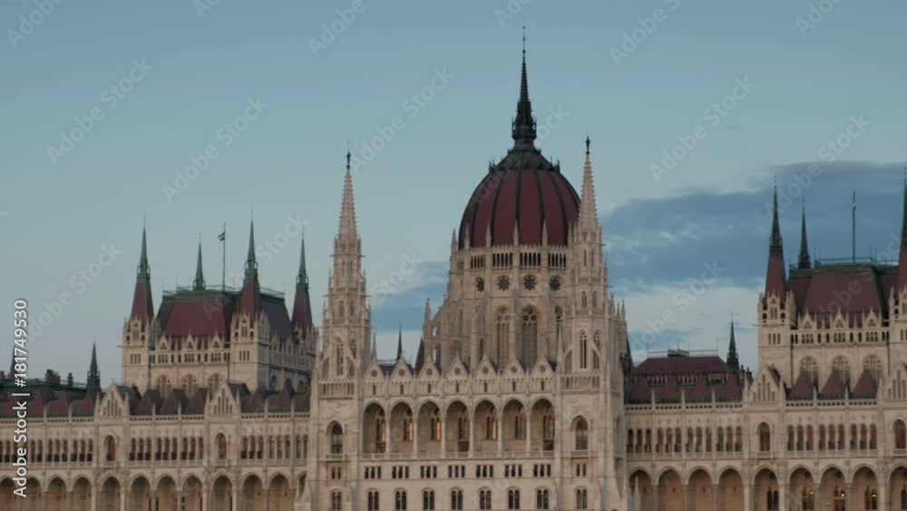 Pan across the upper level of the Hungarian Parliament on the River Danube Budapest. Taken from the opposite bank of the river Pan across the upper level of the Hungarian Parliament on the River Danube Budapest. Taken from the opposite bank of the river