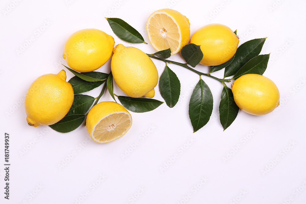 Delicious citrus and green leaves on a white background
