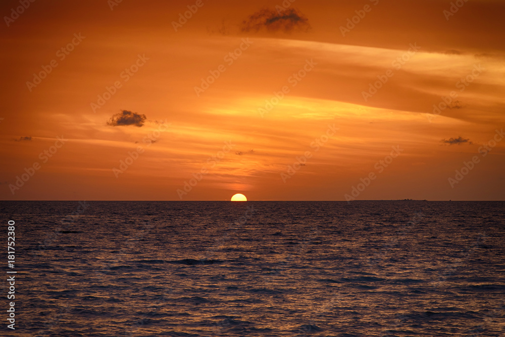 Sunset in the Maldives. Beautiful colorful sunset over the ocean at Maafushi island,Maldives