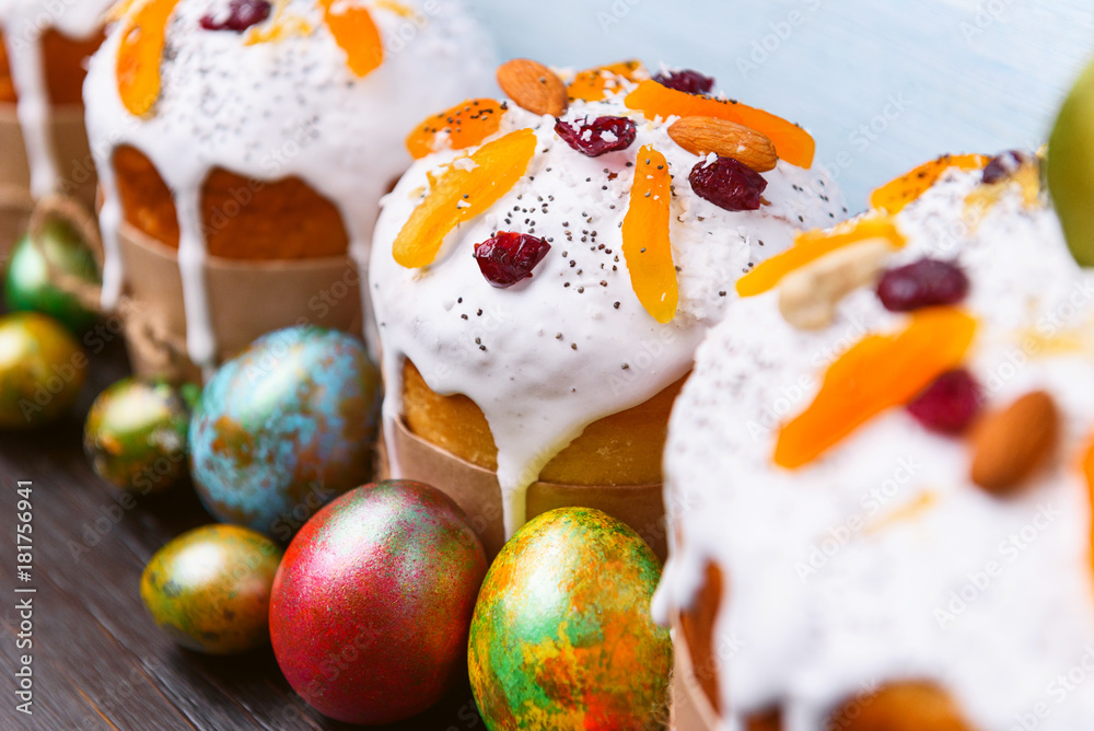 classic Slavic Easter cakes with Easter eggs on a wooden table