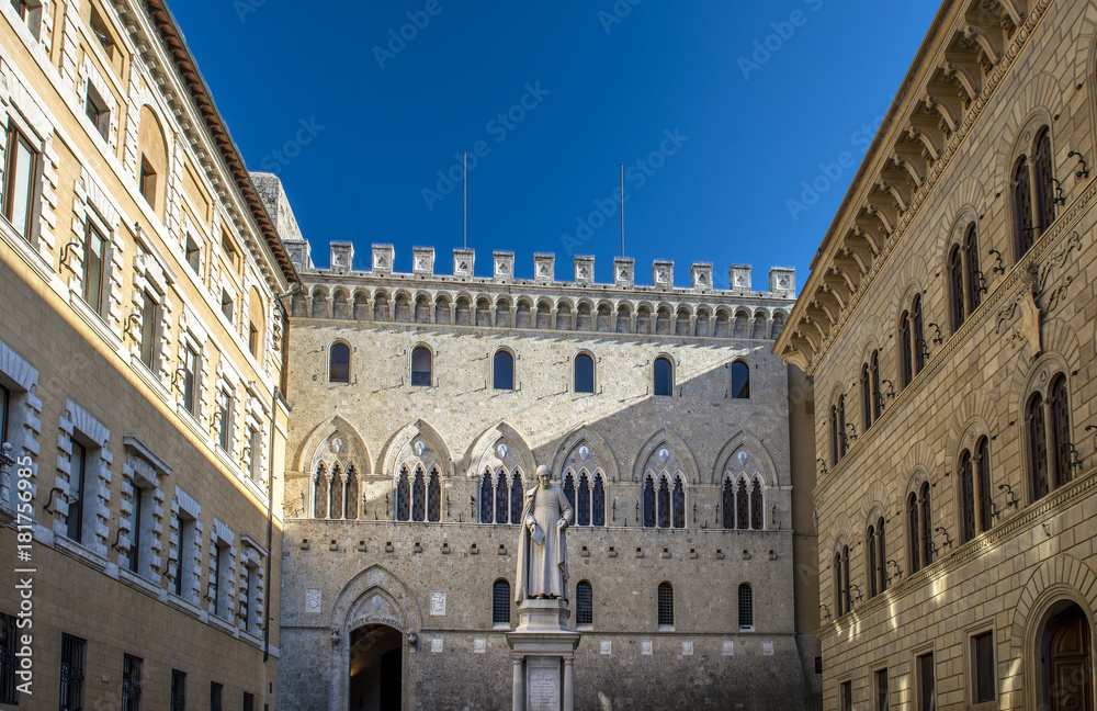 front view of Sallustio Bandini Statue in Piazza Salimbeni, Siena, Italy