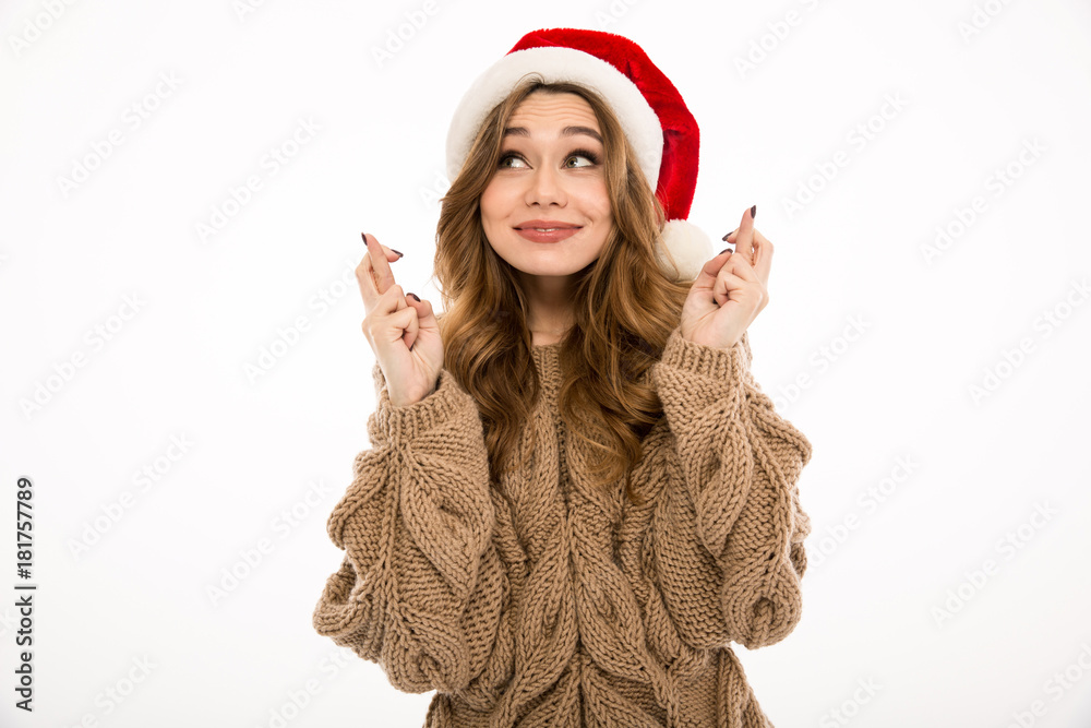 Emotional hopeful young lady dressed in warm sweater Emotional hopeful young lady dressed in warm sweater