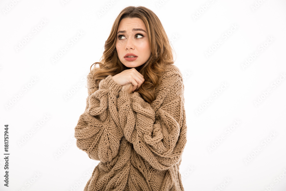 Confused lady dressed in warm sweater
