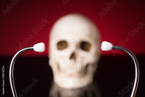 Stethoscope and blurry skull photo