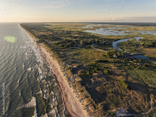 Fotografie Aerial view over a Baltic Sea shore line in Pape, Latvia
