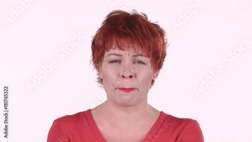 Red haired woman screams, she is aggressively attuned to her colleagues. White background