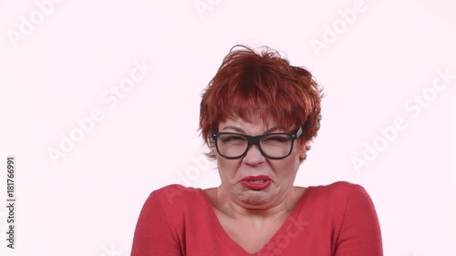 Woman saw a snake, she does not like it. White background