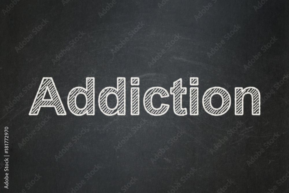 Medicine concept: text Addiction on Black chalkboard background Medicine concept: text Addiction on Black chalkboard background
