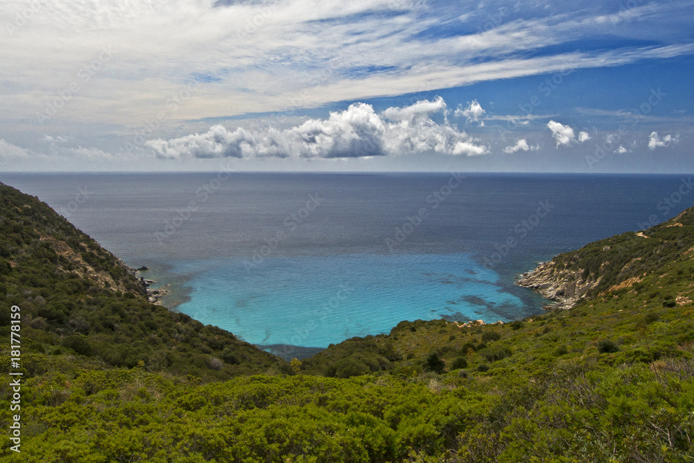 coastal landscape with emerald beach water