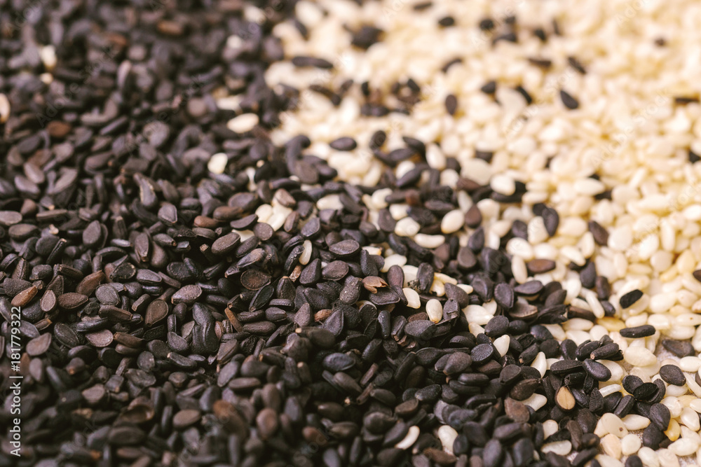 Black and white sesame seeds. Copy space. Top view. Black and white sesame seeds. Copy space. Top view.