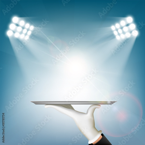 Waiter holds a tray in his hand