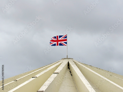 Flag of england floating on a building roof in southport photo