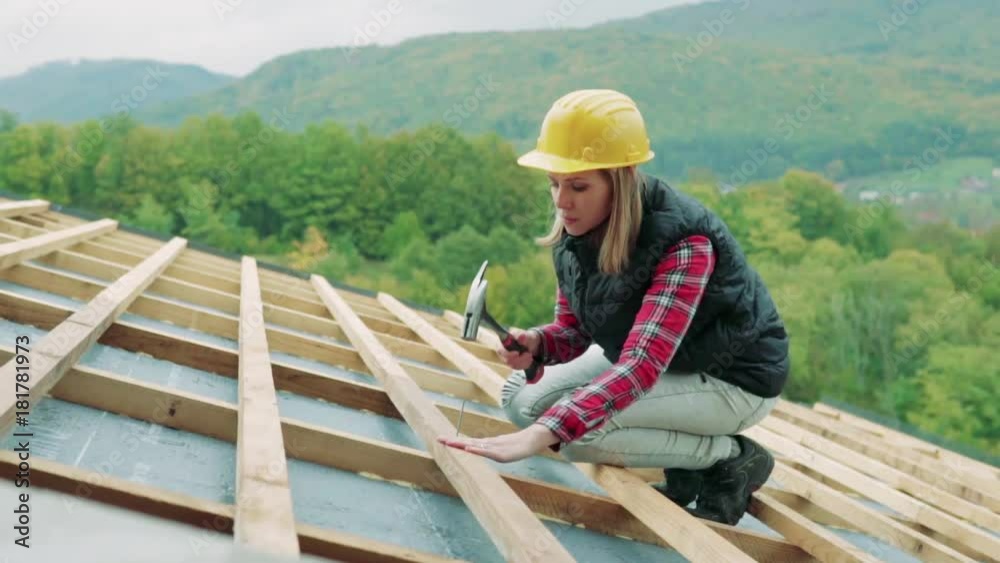 Young woman worker on the construction site. Young woman worker on the construction site.