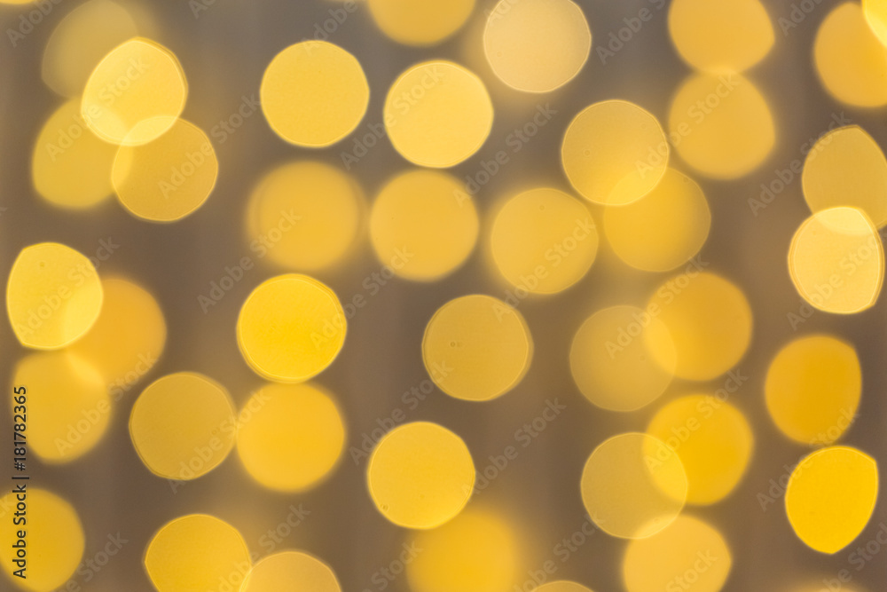 Christmas and Happy new year on blurred bokeh with snowfall banner background of a luminous garland