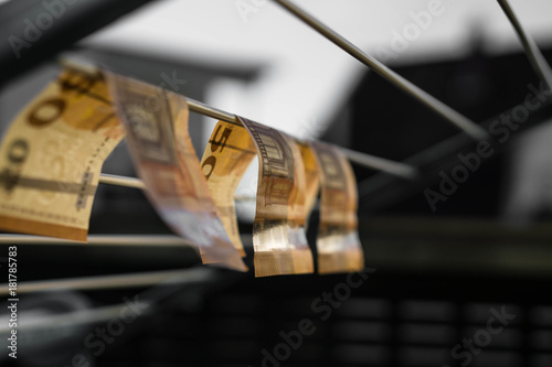 Laundered money hanging to outside to dry photo