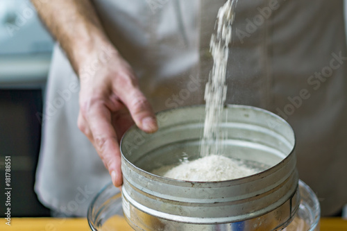 Obraz na płótnie Close-up of a screening sieve for preparing a Christmas cake
