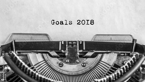 old vintage typewriter happy new year written goals 2018