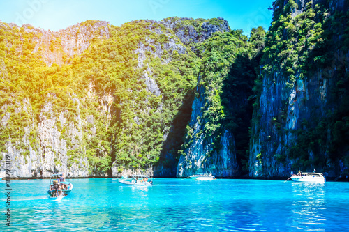 Fototapeta Naklejka Na Ścianę i Meble -  Tourist in boats in Koh Phi Phi Andaman sea, Phuket, Krabi, South of Thailand.