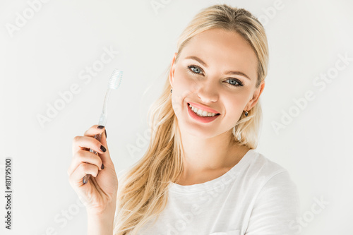 young woman with toothbrush