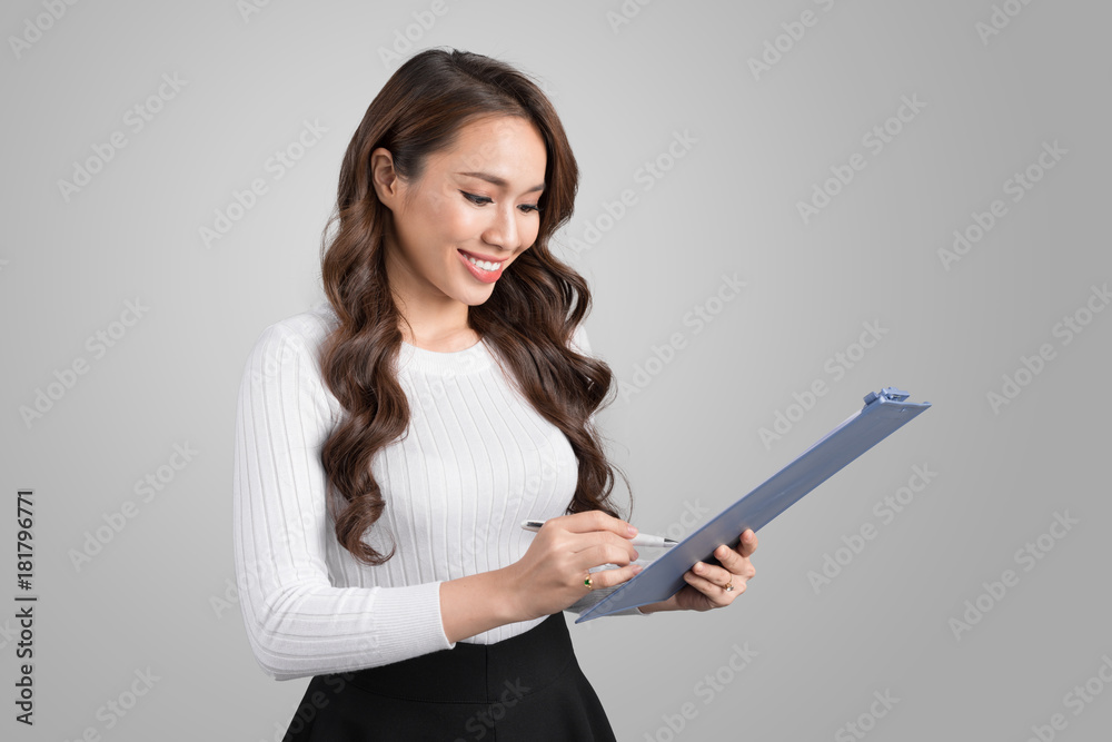 Portrait of young confident asian business woman with folder Portrait of young confident asian business woman with folder