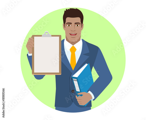 Businessman holding the clipboard and folder