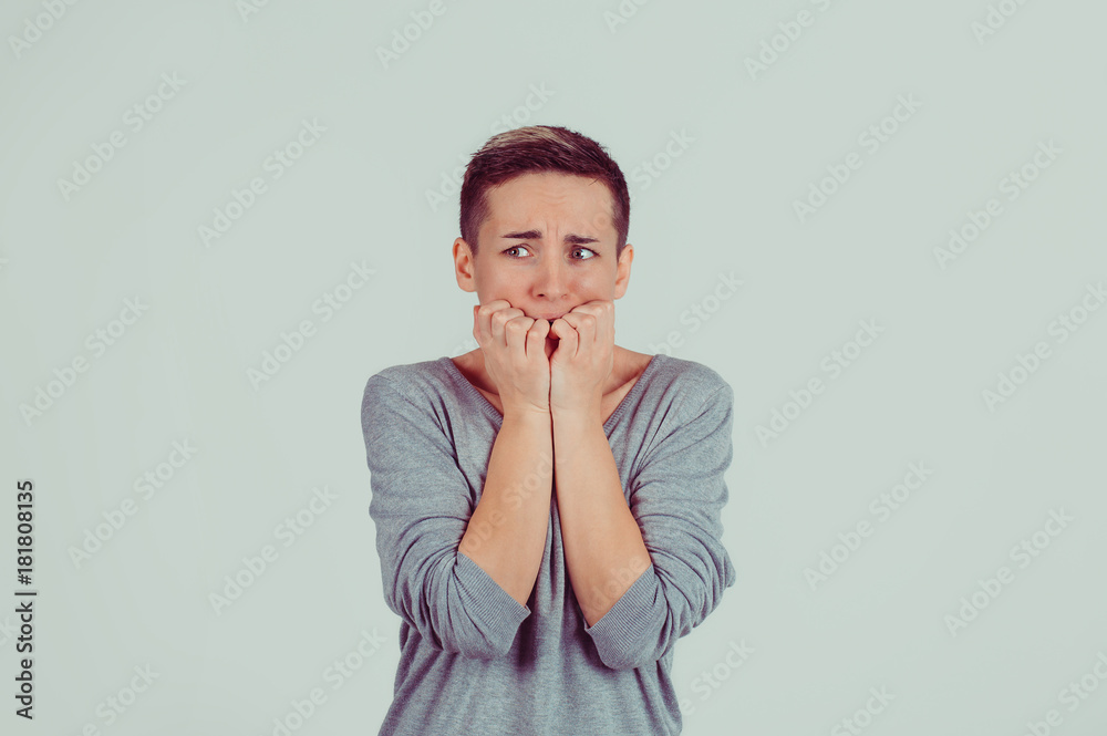 portrait of worried sneaky tricky woman thinking plotting revenge looking at you camera isolated green white grey wall background. human face expressions, emotions, feelings, body language portrait of worried sneaky tricky woman thinking plotting revenge looking at you camera isolated green white grey wall background. human face expressions, emotions, feelings, body language