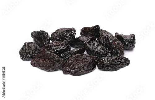 Dry prunes pile isolated on white background