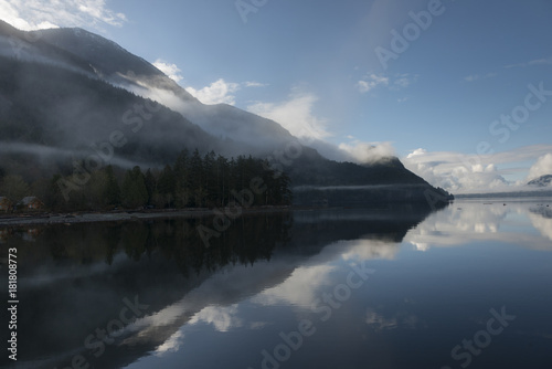 Fototapeta Naklejka Na Ścianę i Meble -  Reflection of trees in water, Furry Creek, British Columbia, Canada