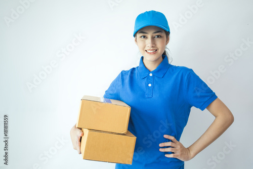 Young Asian Woman with Delivery service worker in uniform. Woman holding Box with attractive  smiling isolated on white background.