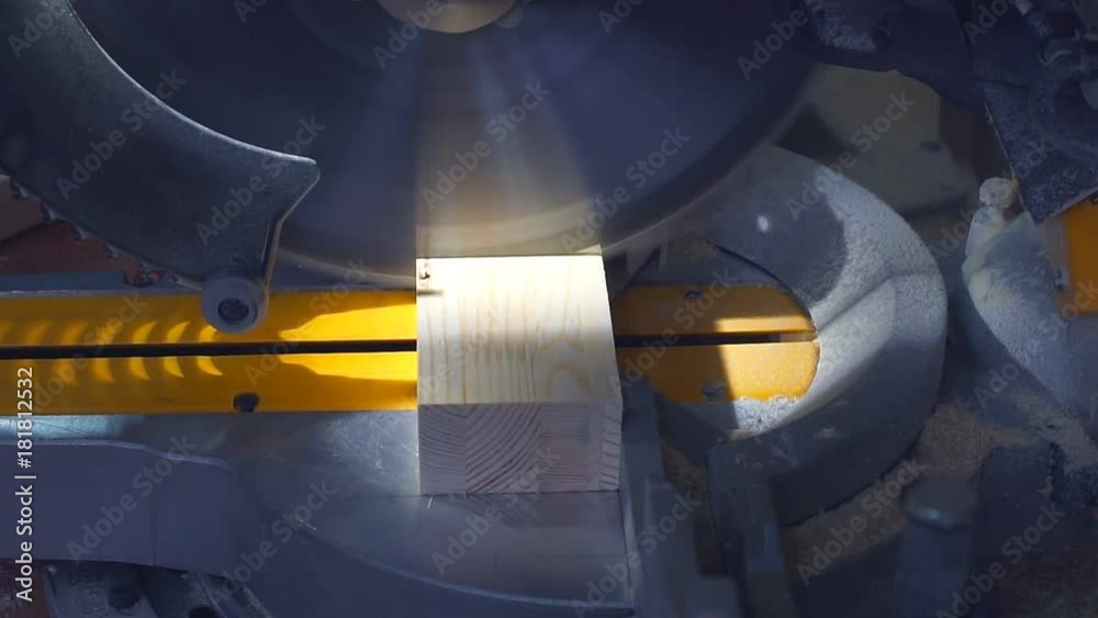 Slow motion carpenter cutting wooden plank with circular blade saw. Slow motion carpenter cutting wooden plank with circular blade saw.