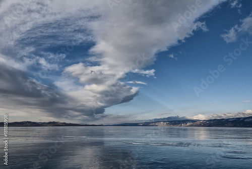 beautiful clouds over the ice of lake Baikal